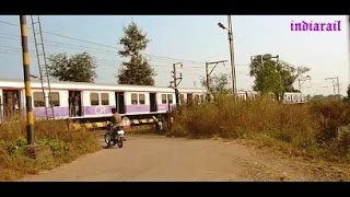 mumbai local train in top speed near shelu railway station crossing  indiarail videos HD [upl. by Attebasile]