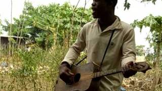 Ivorian Folk Musican [upl. by Uohk99]