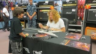 Dave Mustaine of Megadeth signing Vince Minogues Wireless Soul commemorative Dean guitar 071913 [upl. by Charmaine]