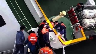 Watch South Korean ferry captain rescued from disaster [upl. by Kulda859]