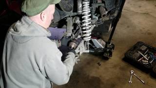 Greasing a rear wheel bearing rzr 900s [upl. by Bowden]