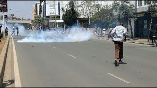 Police lob tear gas to disperse protestors at IEBC offices [upl. by Nylrehs]