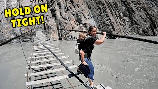 CROSSING PAKISTANS DEADLIEST BRIDGE 🇵🇰  Riding the Hussaini Suspension Bridge Zipline [upl. by Ayikan]