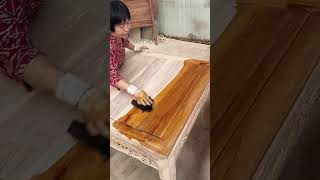 The process of brushing wood wax oil on wood table [upl. by Volny]