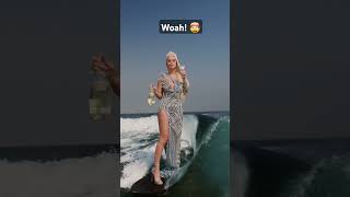 Surfing on HEELS 😱 viralvideo surf lifestyle wow [upl. by Thorvald]