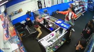 VIDEO Gun battle breaks out between store employee and wouldbe robbers [upl. by Borchers672]