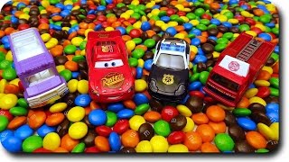 Disney Cars Pixar Lightning McQueen MampMs Ball Pit Surprise Cars Toys Hide amp Seek with Police cars [upl. by Sadoff]