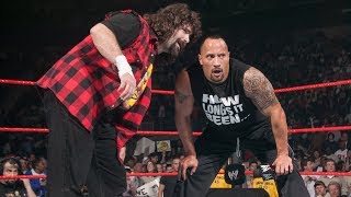 The Rock returns to help Mick Foley against Evolution Raw March 1 2004 [upl. by Ahtimat318]