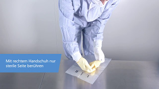 Sterile Handschuhe in einem Reinraum anziehen [upl. by Gorga]