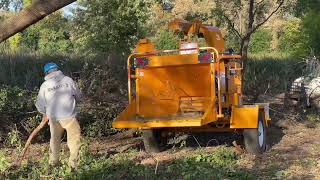 John Deere Tractor Feeding Bandit Woodchipper [upl. by Llereg]