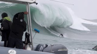 Visitors from all over the world flock to Mavericks Beach as surfers brave massive waves [upl. by Michal]