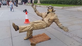 Secret revealed London street performer floating and levitating trick [upl. by Ailemak]