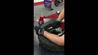 Mounting an ATV Tire with a BeadBuster and Tire Levers [upl. by Breh568]