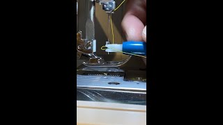 Easiest Way to Thread a Sewing Machine Needle  Thread a Sewing Machine Needle in 5 Seconds shorts [upl. by Lever]