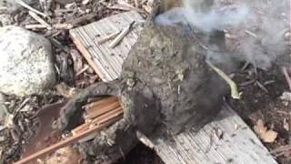 Bushcraft Clay and Mud Rocket Stove [upl. by Ennywg]