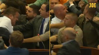 Kosovan parliament in massive brawl after Prime Minister sprayed with water by opposition MP [upl. by Nosniv133]