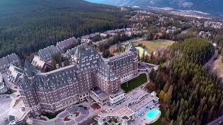 Aerial Video  Banff Springs Hotel and Surrounding Landscape  First Flight [upl. by Aklog422]