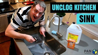 How to unclog a kitchen sink using baking soda and vinegar [upl. by Sidnac]