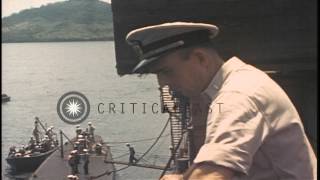 Men loading a torpedo into USS Blower in the United States HD Stock Footage [upl. by Aihseyk675]