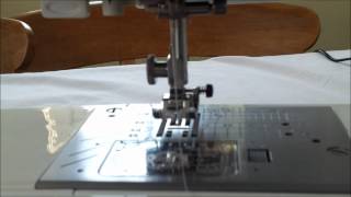 Putting the bobbin in my Janone TXL607 and threading the machine [upl. by Aytac]