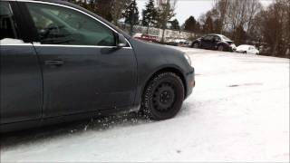 VW Golf TDI wagon with General Altimax Arctic snow tires slope climb [upl. by Inoy495]