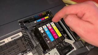 How to replace Epson WorkForce printer ink cartridge change cartridges Epson multifunction device [upl. by Oeramed]