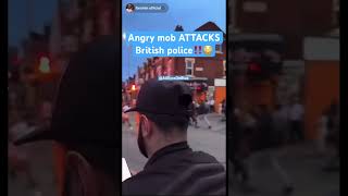 Angry mob ATTACKS British police shorts [upl. by Dougall]