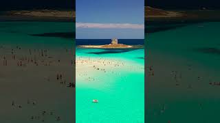 Il Gioiello Blu di Stintino quot La Pelosa dipinta di Blu quot  4K  Sardegna World [upl. by Leahcimdivad]