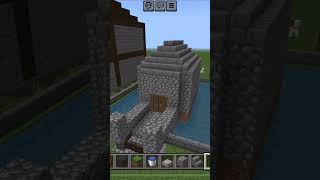 How To Build A Cobblestone House with Moat And Bridge In Minecraft minecraft mincraftshort gaming [upl. by Nella215]