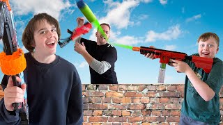 Our Dad Tried to Sneak Attack Us Family Nerf Battle [upl. by Eened]