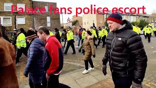 Crystal Palace fans police escort at Arsenal Too many Police Arsenal fans celebrate 50 win [upl. by Ariamo833]