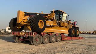 Caterpillar 24H Motor Grader transporting and unload over size machine heavy equipment mega machine [upl. by Idmann861]