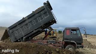 Fuso dump truck 10 wheeler 8DC9 double leff unloading soil [upl. by Daryn267]