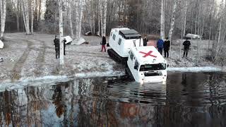 Amphibious BV206 Hagglund swimming in ice cold water [upl. by Trilley]