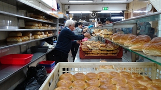 Master Bakers making 100s of bagels at World Famous 24 hour bakery quotBeigel Bakequot Brick Lane London [upl. by Adrahs]