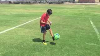 11 year old kid solves a rubiks cube while juggling a soccer ball [upl. by Darda]