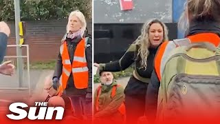 Insulate Britain block M25  Furious mum screams ‘I’ll drive through you then [upl. by Teragramyram133]