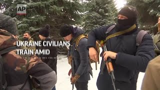 Ukrainians volunteer to fend off potential attack [upl. by Yeh]