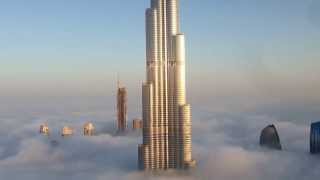 Burj Khalifa and Dubai Downtown are raising from the fog [upl. by Htebazila]