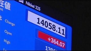 Nikkei breaks 14000 barrier for first time in 5 years  economy [upl. by Atnwahs]