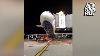 Wild video JetBlue plane tipping backward at JFK Airport gate after ‘shift in weight and balance ‘ [upl. by Arik]