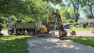 Our driveway being taken out by the city while getting new sidewalks in our neighborhood 81324 [upl. by Ennaj465]