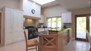 Wimborne White Kitchen with Character Oak Panels  Guildford Surrey  BeauPort Kitchens [upl. by Enerod462]