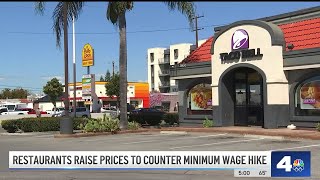 Los Angeles fast food restaurants raise prices to counter wage hike [upl. by Fahey]