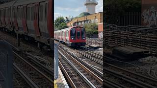 Metropolitan Line speeds past Willesden Green shorts [upl. by Earesed]