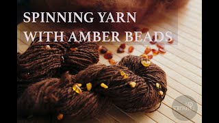 How to spin yarn with amber beads on Spinning wheel [upl. by Isacco]