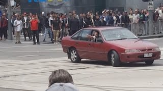 Car filmed driving erratically before mowing down pedestrians in Melbourne [upl. by Adorne]