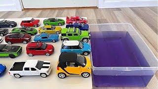 Various Die cast Cars Sliding Into The Purple Water [upl. by Aida348]