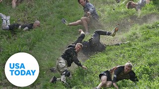 People cheese roll downhill wipeout in quirky annual competition  USA TODAY [upl. by Pacheco]