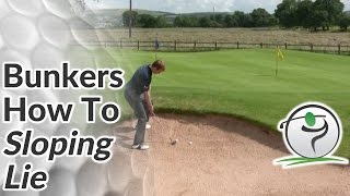 Golf Bunker Shot  How to Hit from a Sloping Lie [upl. by Atig]